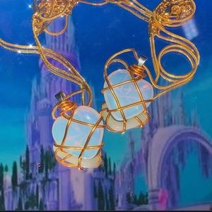 Two Barbie diamond castle necklaces